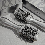 Compact blow dryer brush in steel silver